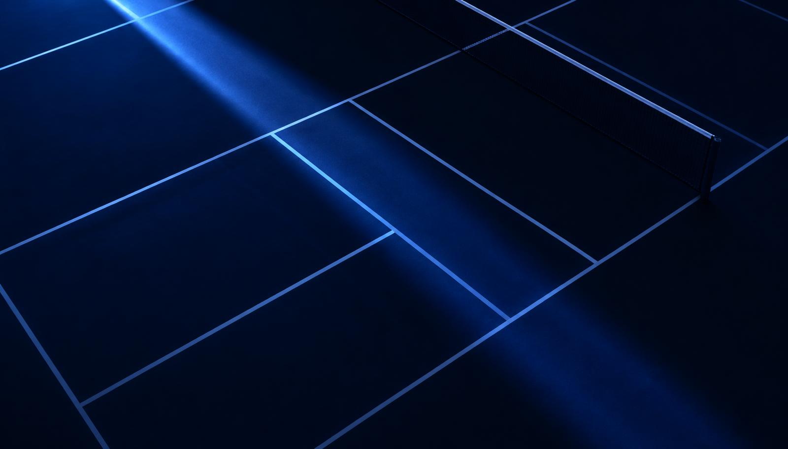 Court lines lit by a beam of blue light